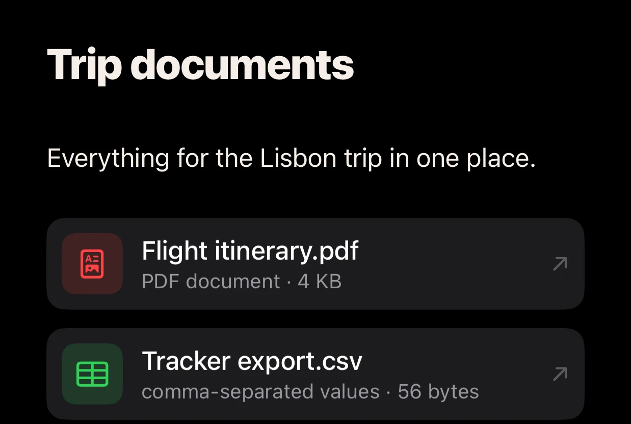 A note on iPhone holding a PDF and a CSV file, in dark mode